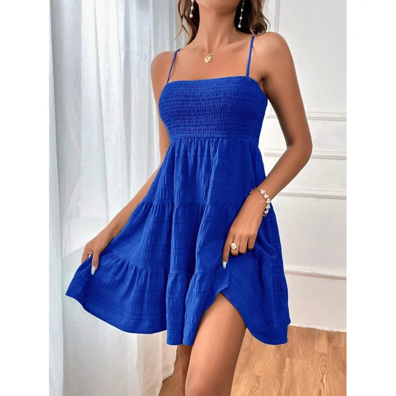 Light, feminine, and effortlessly chic — the perfect mini dress for sunny escapes.