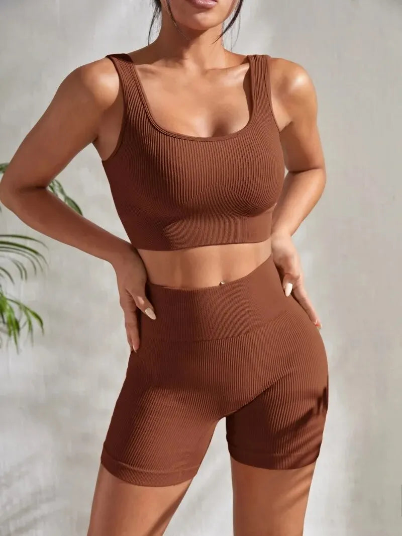 2-piece women's workout set – ribbed crop top and high-waist shorts.