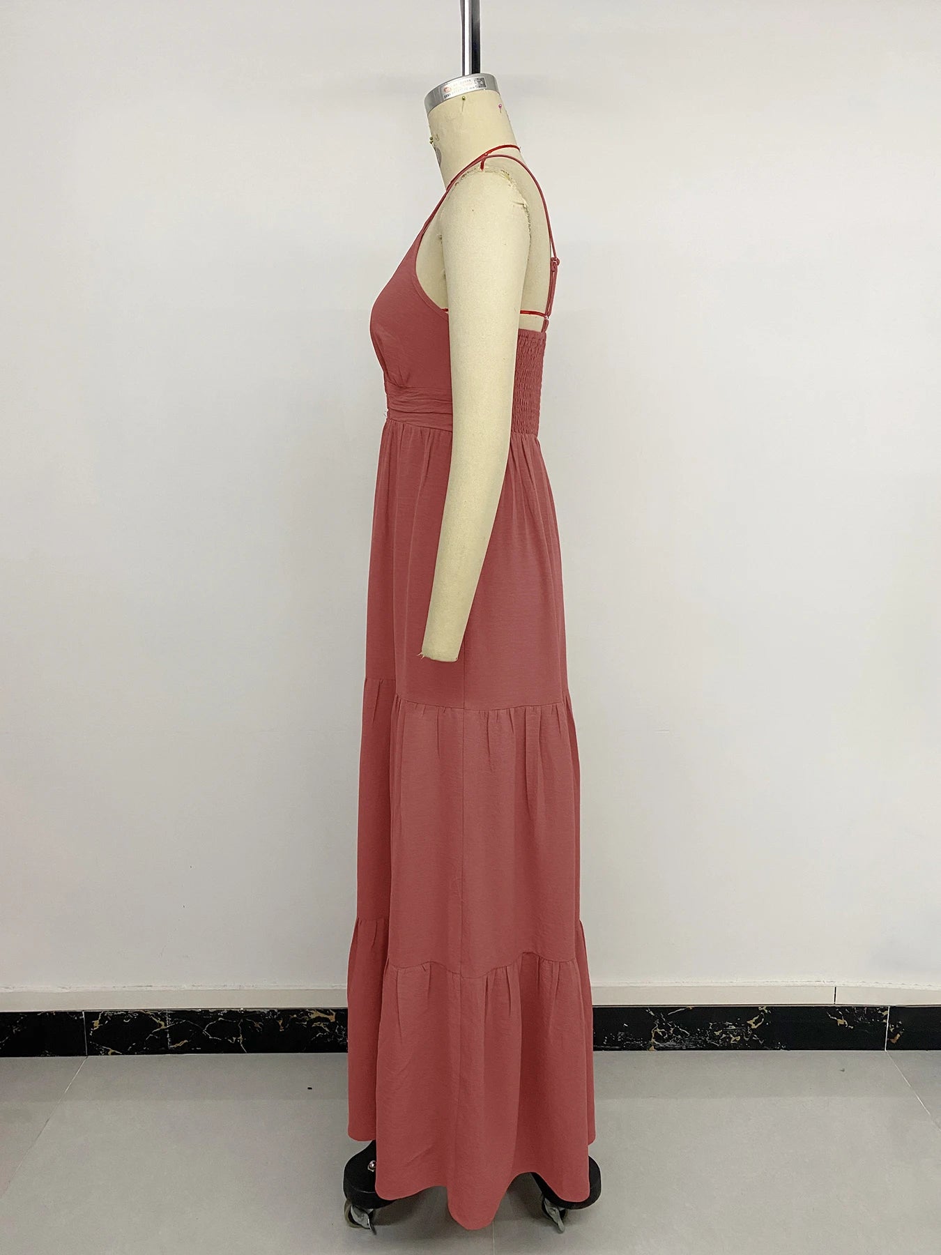 Beach dress with deep V-neck and wide sleeves. Light, relaxed, and perfect for summer days.