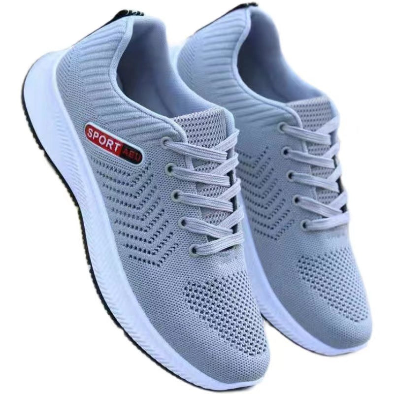 Sapatos casuais respiráveis ​​​​da moda all-match da malha tecida da mosca dos homens