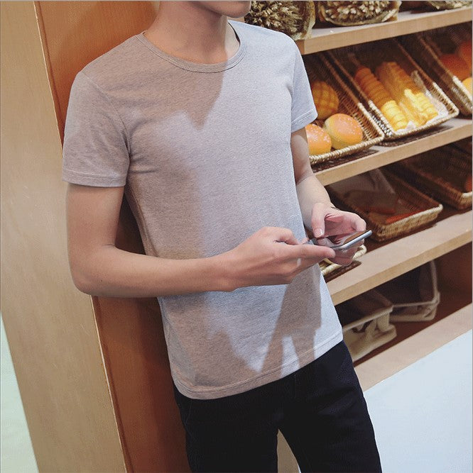 Camisa justa com gola redonda e meia manga