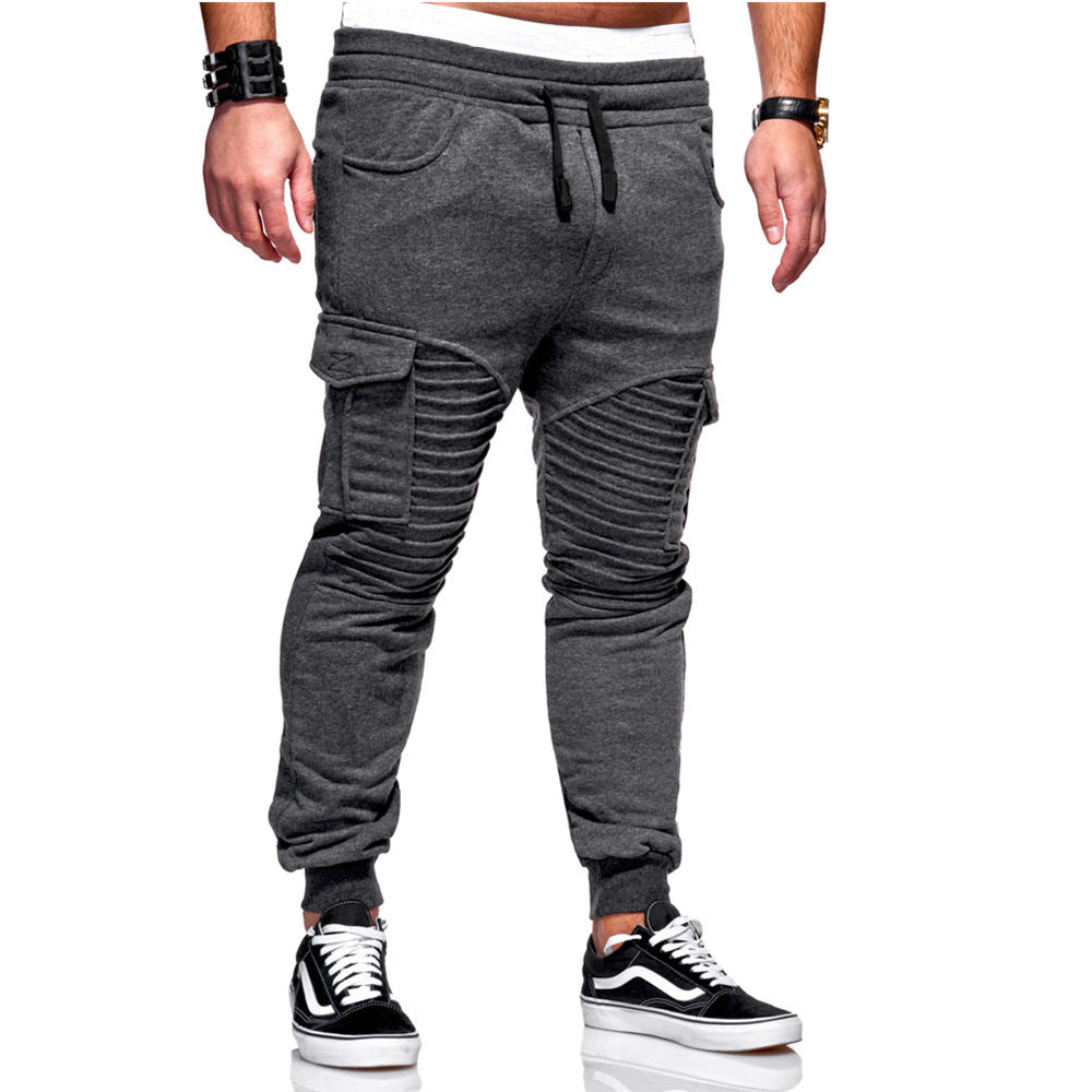 Calças de fitness com costura plissada masculina e bolsos laterais grandes