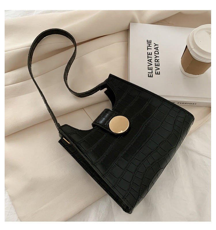 Bolsa de ombro com estampa de crocodilo de cor sólida