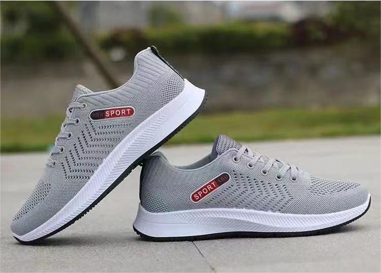 Sapatos casuais respiráveis ​​​​da moda all-match da malha tecida da mosca dos homens