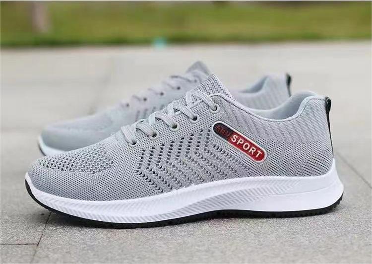 Sapatos casuais respiráveis ​​​​da moda all-match da malha tecida da mosca dos homens