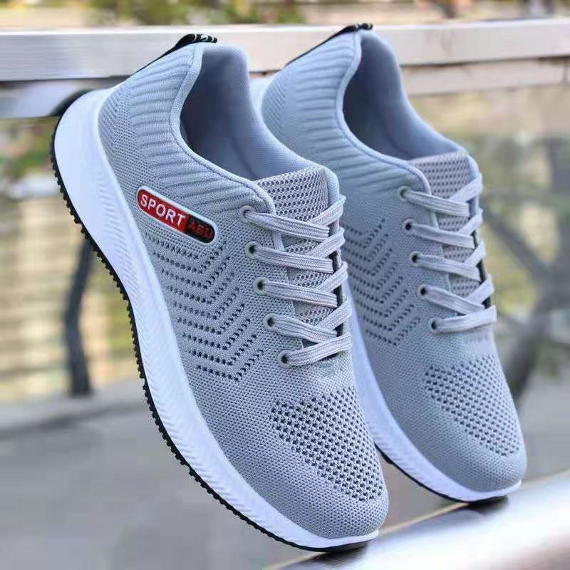 Sapatos casuais respiráveis ​​​​da moda all-match da malha tecida da mosca dos homens