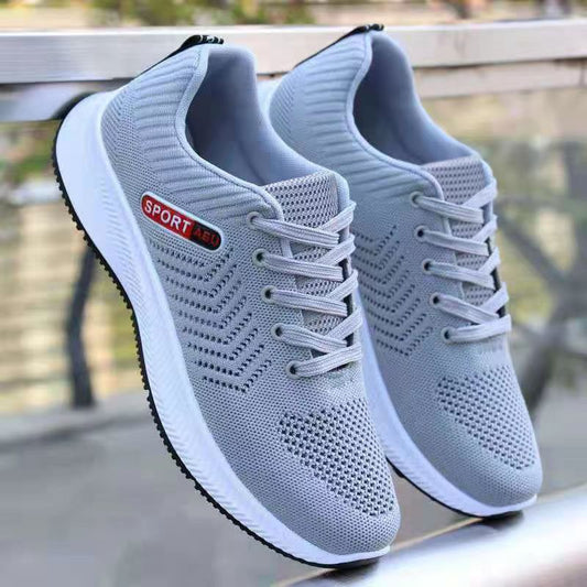 Sapatos casuais respiráveis ​​​​da moda all-match da malha tecida da mosca dos homens
