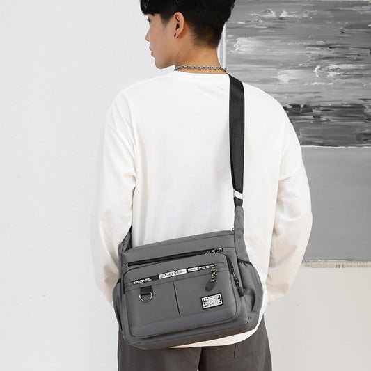 Bolso bandolera de gran capacidad con múltiples bolsillos
