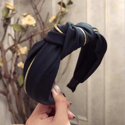 Banda para el cabello con borde ancho y nudo en contraste de rayas