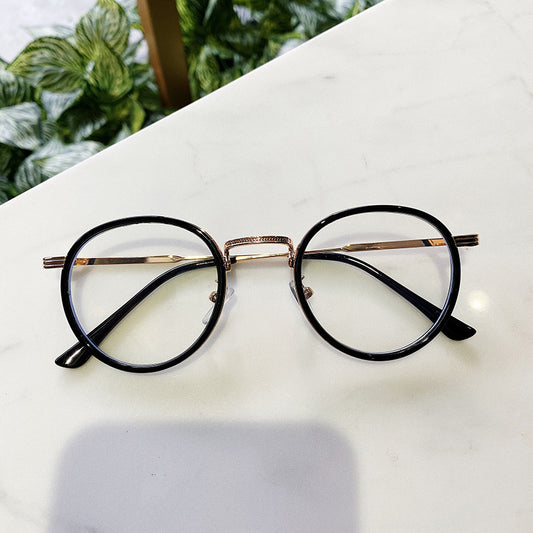 Montura de gafas de metal retro con marco redondo