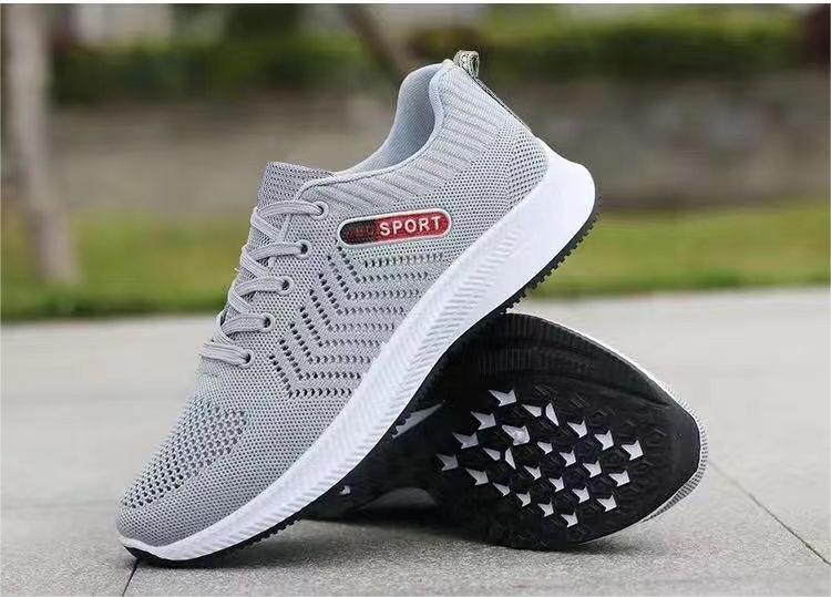 Sapatos casuais respiráveis ​​​​da moda all-match da malha tecida da mosca dos homens