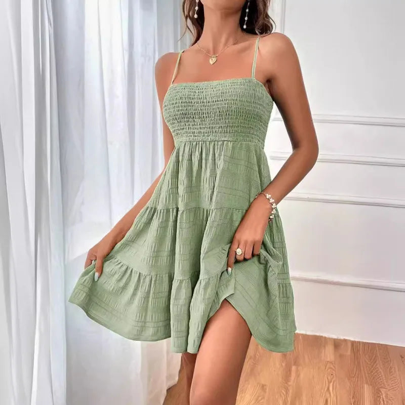 Light, feminine, and effortlessly chic — the perfect mini dress for sunny escapes.