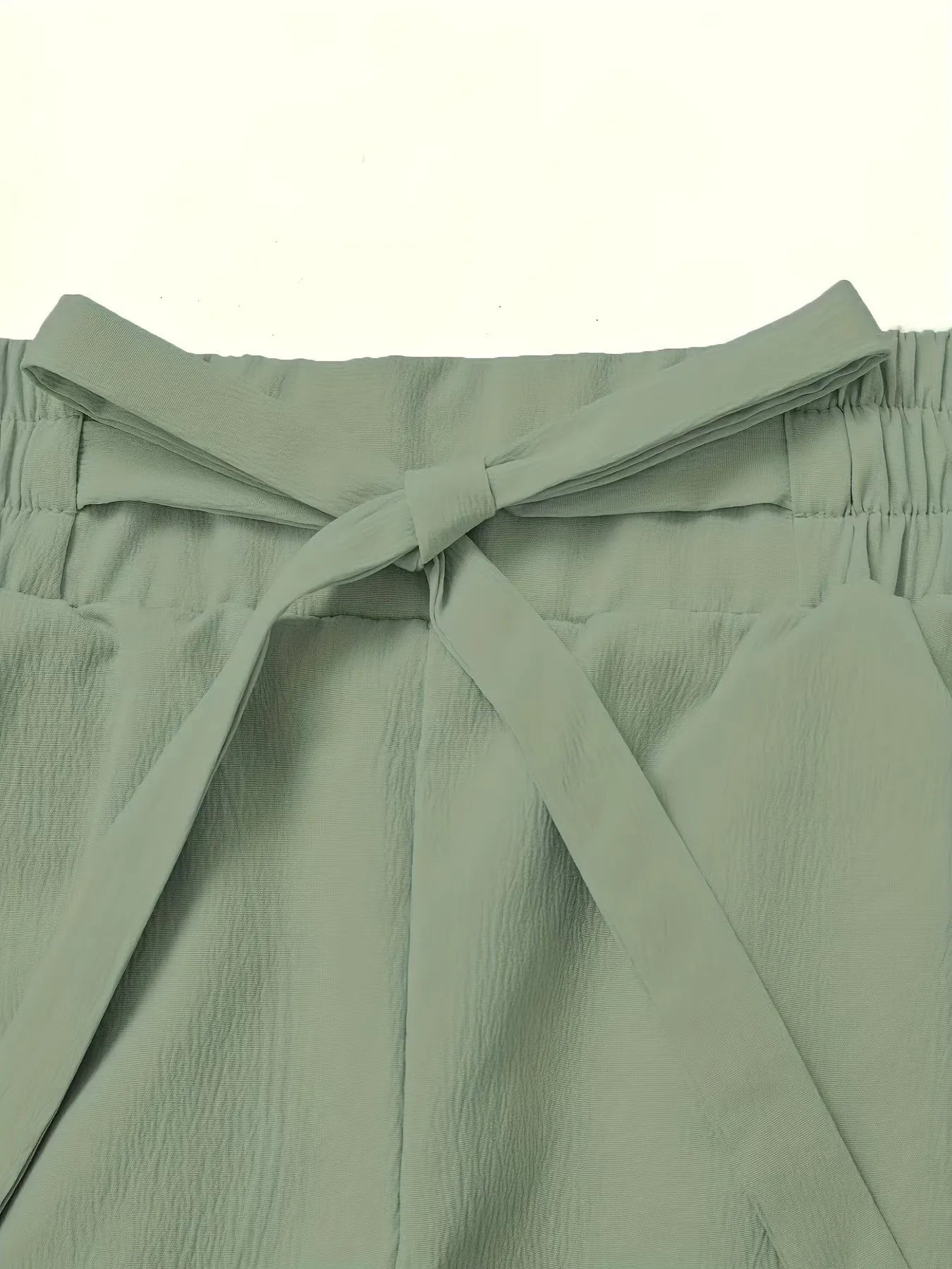 Elegant & trendy set: camisole top + elastic waist wide-leg pants. Comfortable, stylish, and perfect for any occasion.