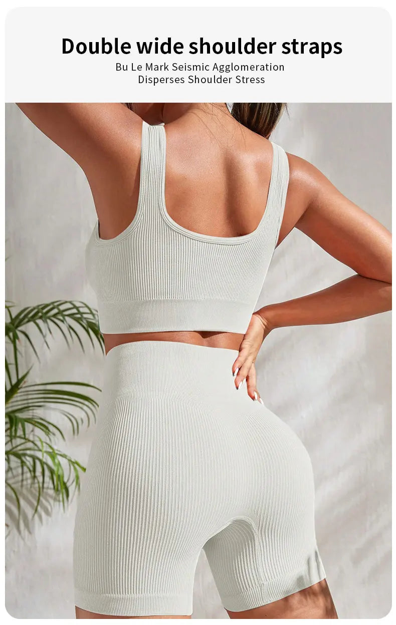 2-piece women's workout set – ribbed crop top and high-waist shorts.