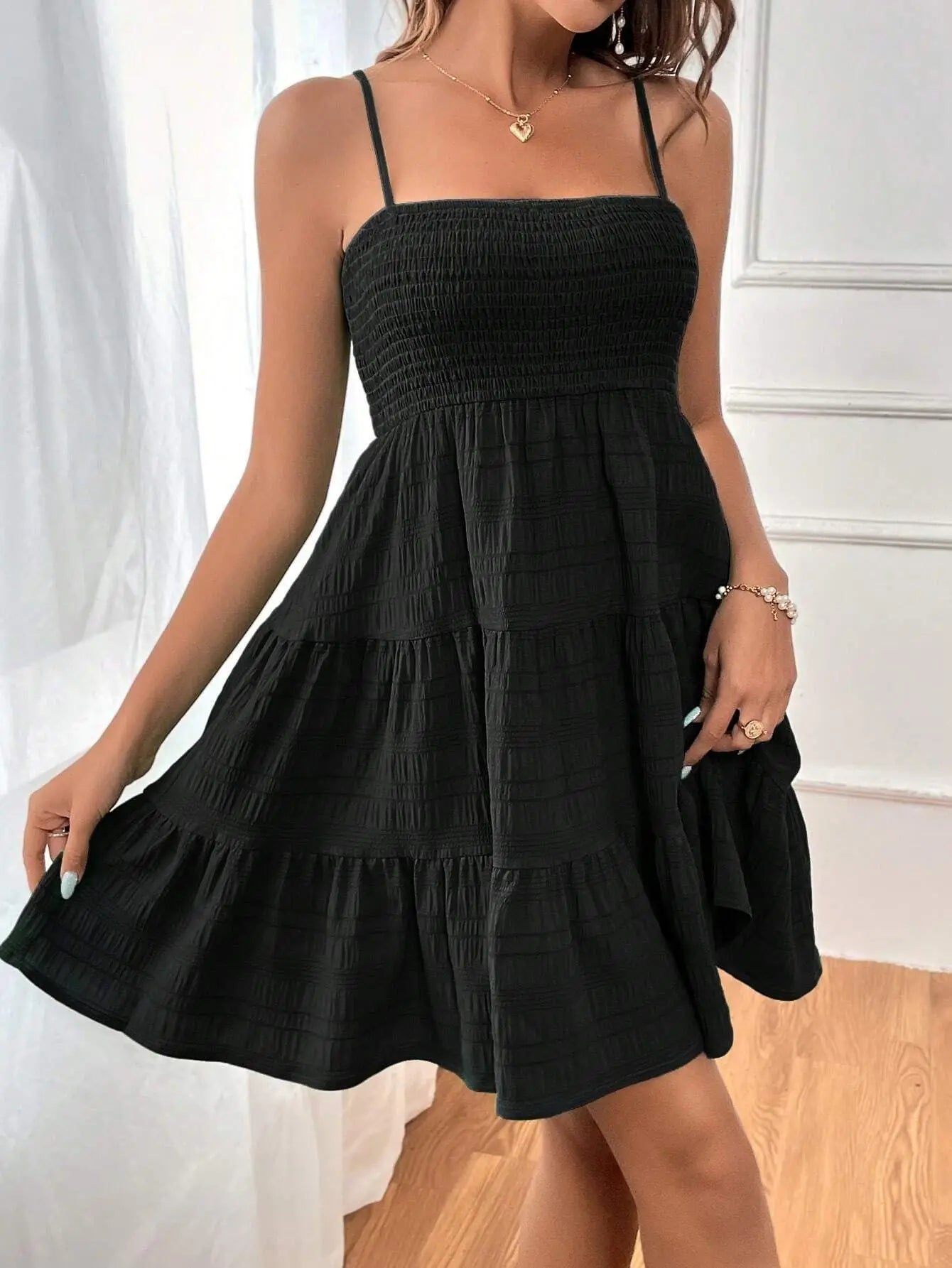 Light, feminine, and effortlessly chic — the perfect mini dress for sunny escapes.