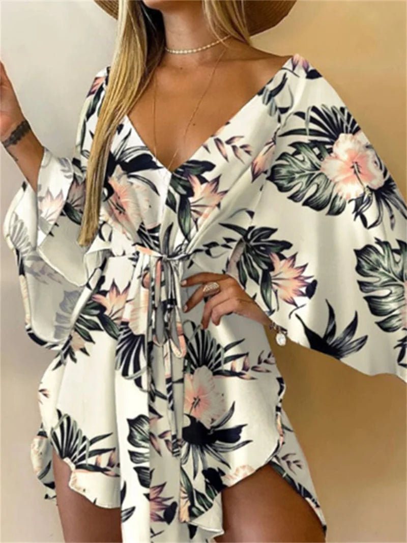 Boho Floral Mini Dress – Sexy V-Neck, Bat Sleeves & Flowy Fit for a Relaxed Summer Look.