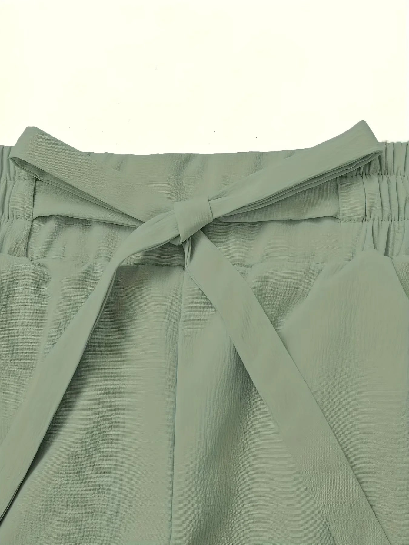 Elegant & trendy set: camisole top + elastic waist wide-leg pants. Comfortable, stylish, and perfect for any occasion.