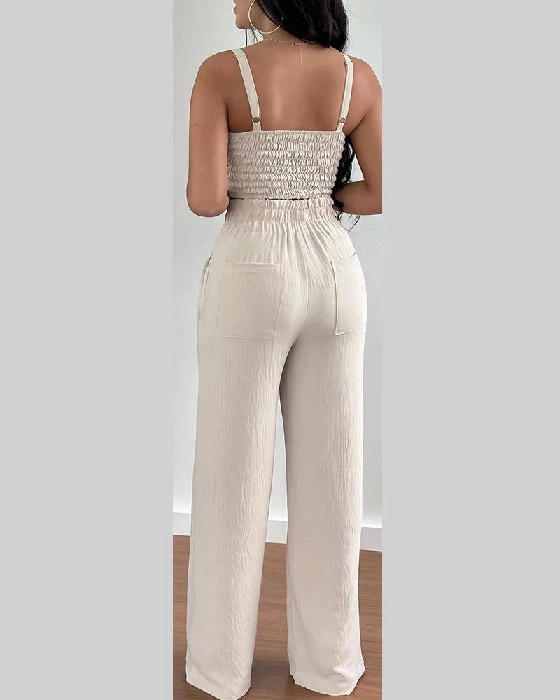 Elegant 2-piece set with a V-neck crop top and lace-up wide-leg pants — modern, flattering, and effortlessly chic.