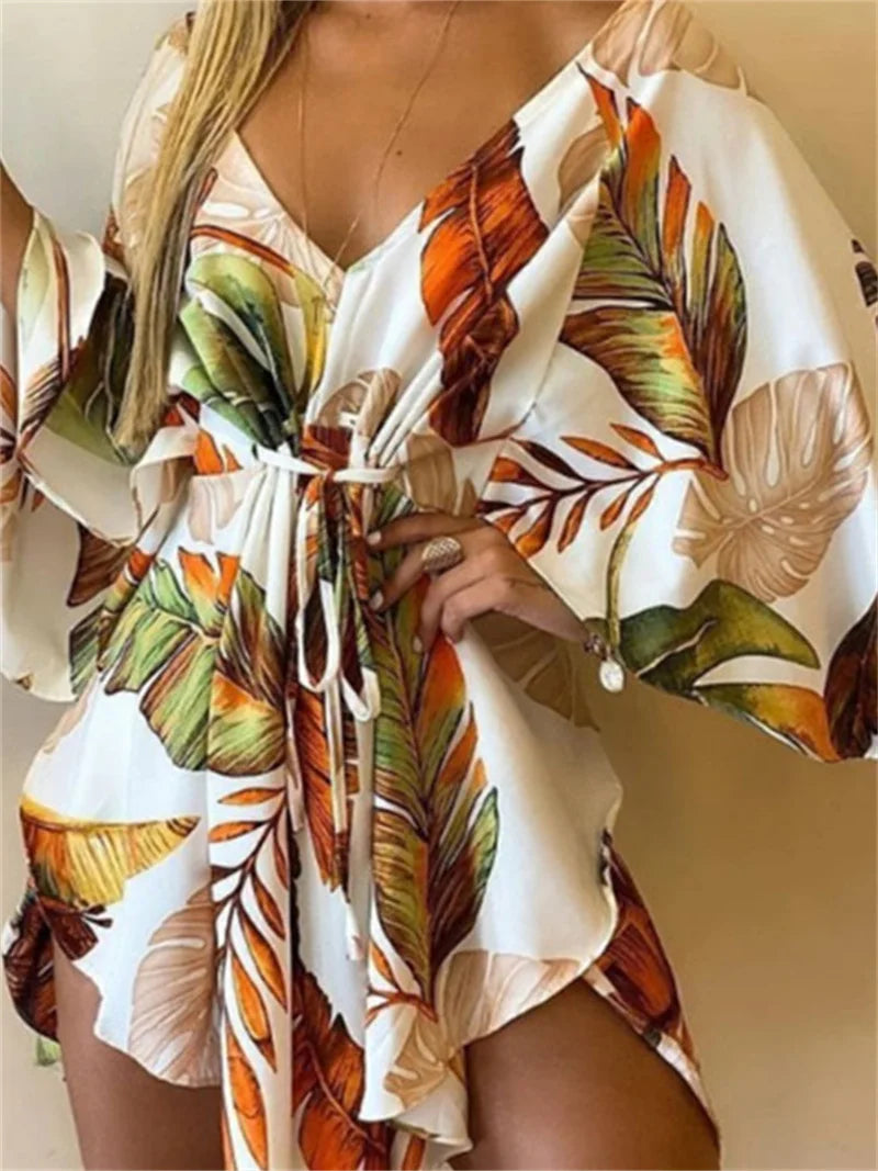 Boho Floral Mini Dress – Sexy V-Neck, Bat Sleeves & Flowy Fit for a Relaxed Summer Look.