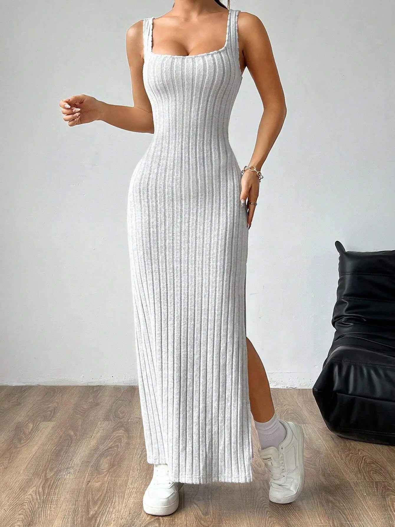 Elegant slim knitted dress with a backless design — sleek, modern, and effortlessly stylish.
