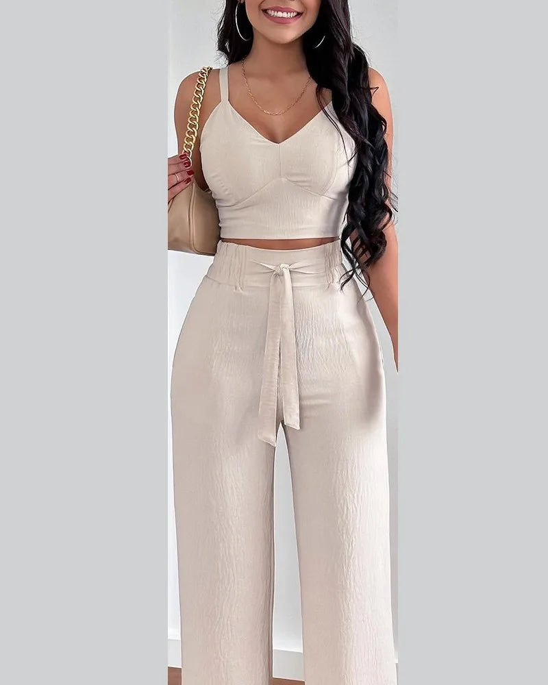 Elegant 2-piece set with a V-neck crop top and lace-up wide-leg pants — modern, flattering, and effortlessly chic.