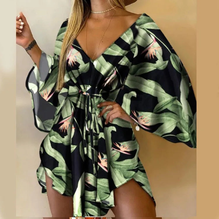 Boho Floral Mini Dress – Sexy V-Neck, Bat Sleeves & Flowy Fit for a Relaxed Summer Look.