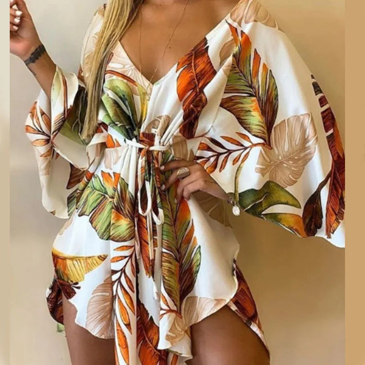 Boho Floral Mini Dress – Sexy V-Neck, Bat Sleeves & Flowy Fit for a Relaxed Summer Look.