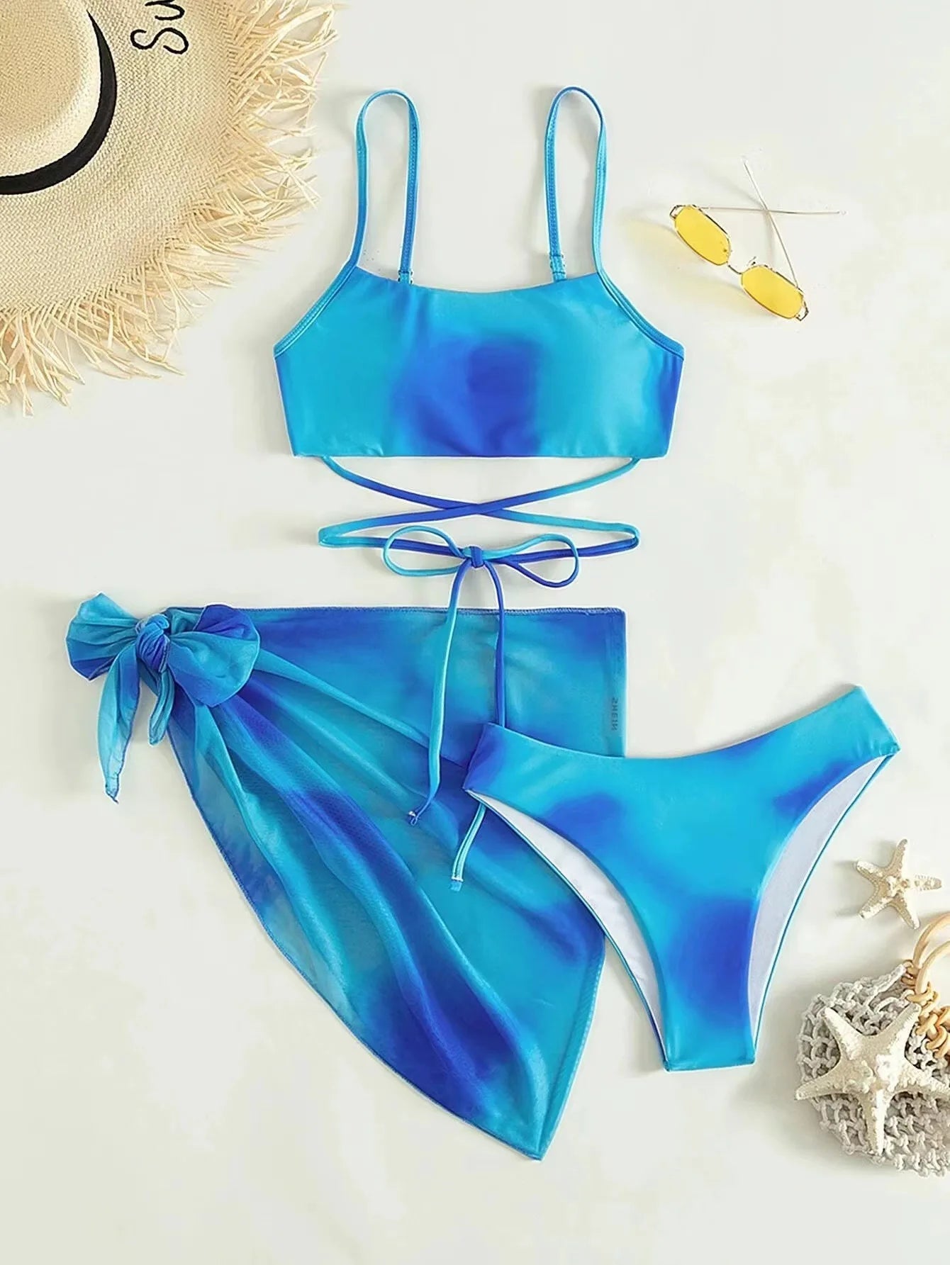 Stylish Tie-Dye 3-Piece Bikini Set with Mesh Skirt. Perfect for summer!