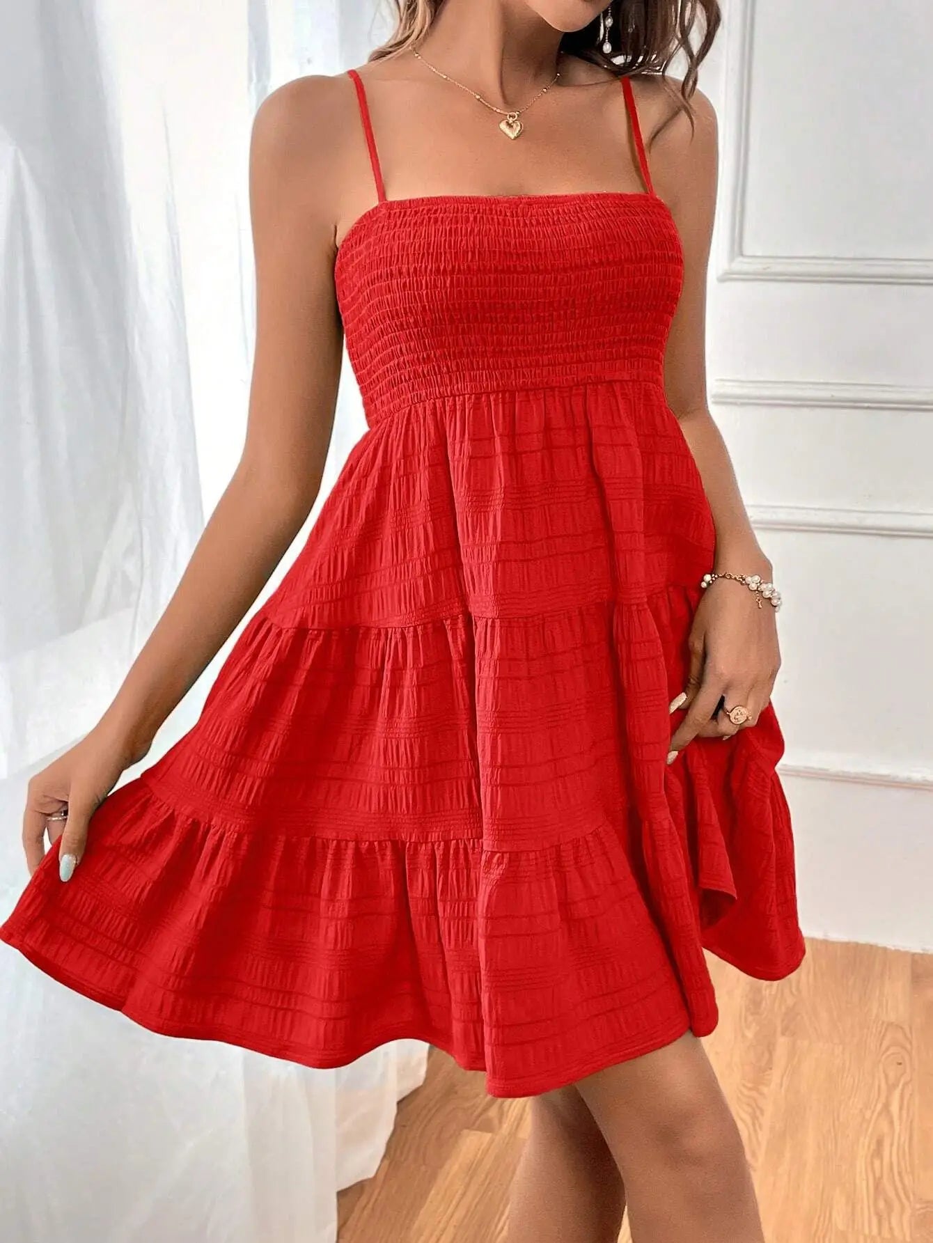 Light, feminine, and effortlessly chic — the perfect mini dress for sunny escapes.