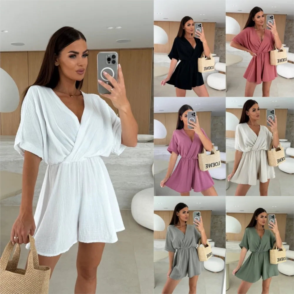 Elegant white romper with a deep V-neck and short sleeves — light, effortless, and perfect for summer days.