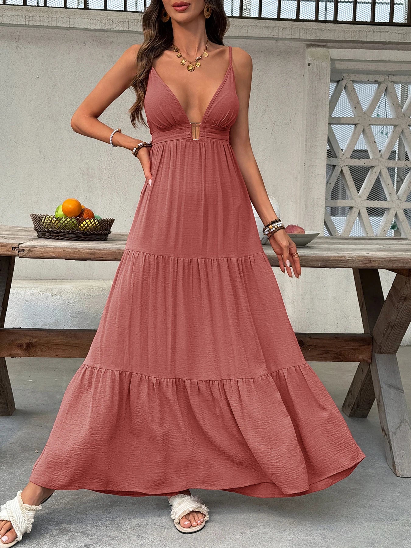 Beach dress with deep V-neck and wide sleeves. Light, relaxed, and perfect for summer days.