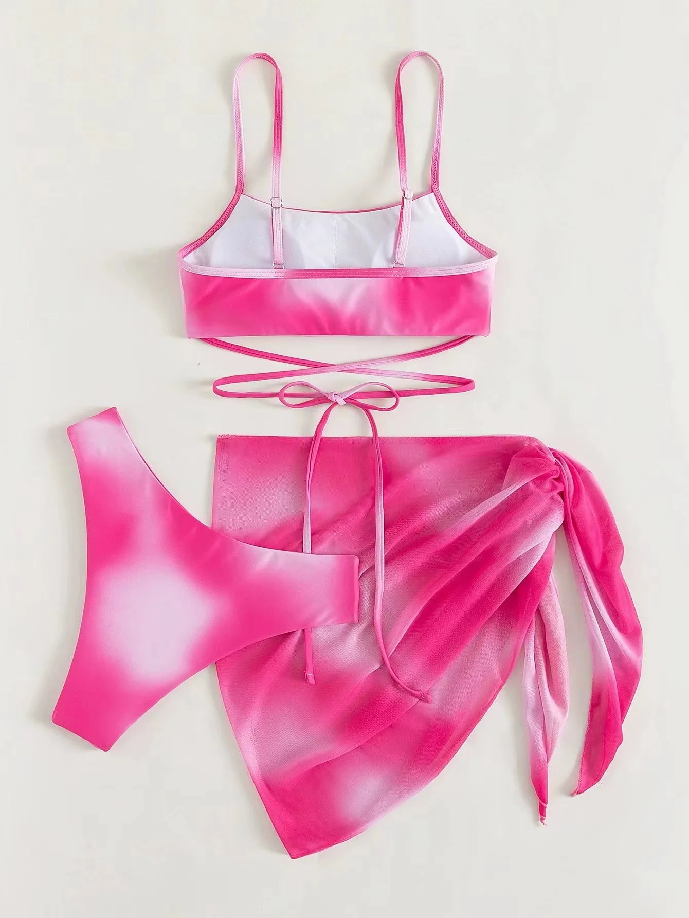 Stylish Tie-Dye 3-Piece Bikini Set with Mesh Skirt. Perfect for summer!
