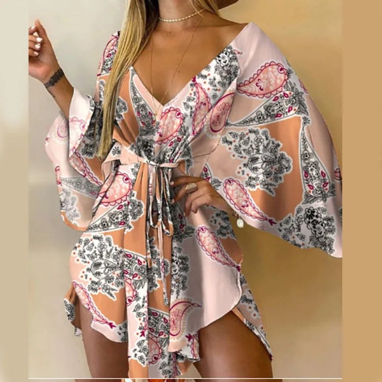 Boho Floral Mini Dress – Sexy V-Neck, Bat Sleeves & Flowy Fit for a Relaxed Summer Look.