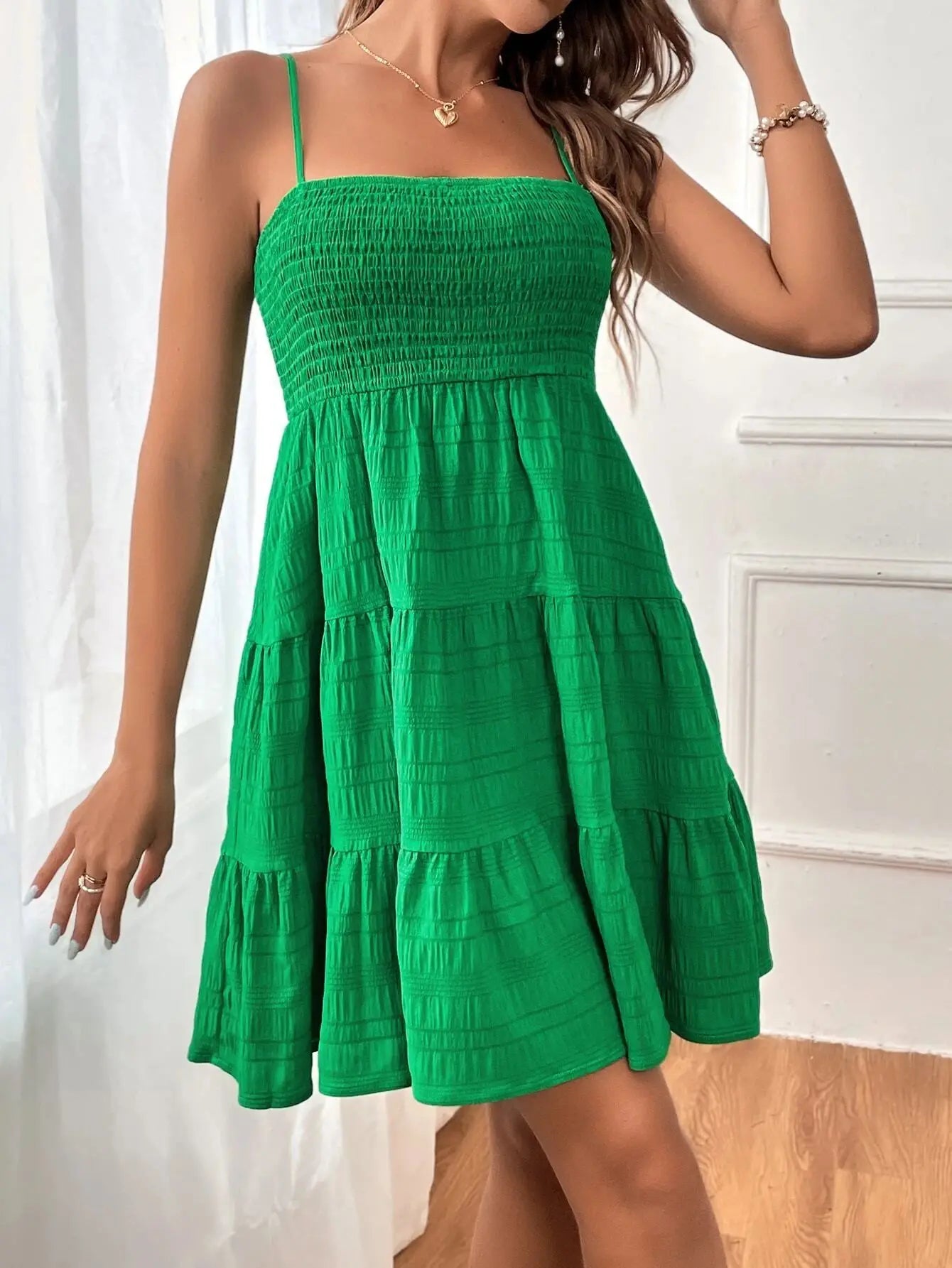 Light, feminine, and effortlessly chic — the perfect mini dress for sunny escapes.