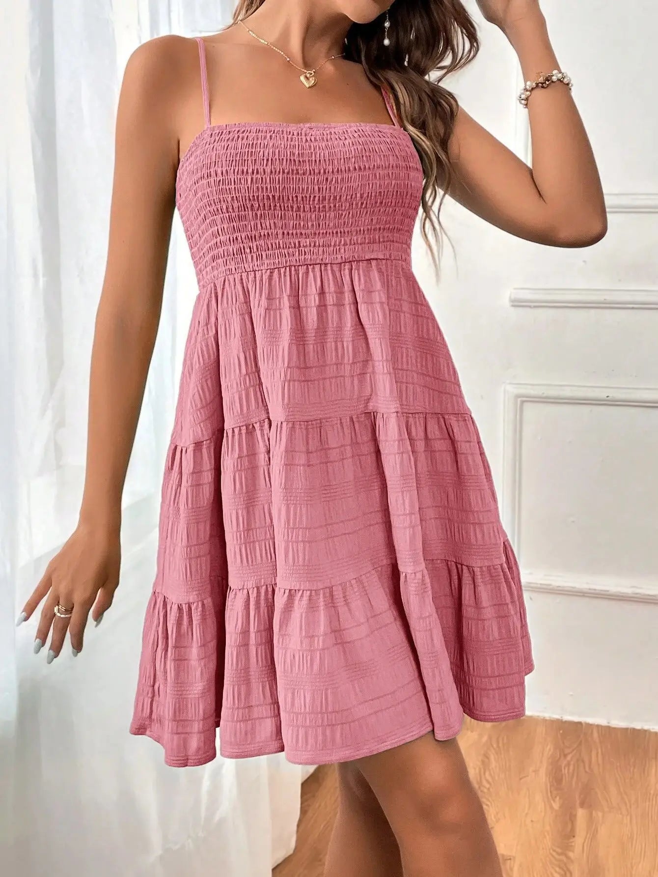 Light, feminine, and effortlessly chic — the perfect mini dress for sunny escapes.