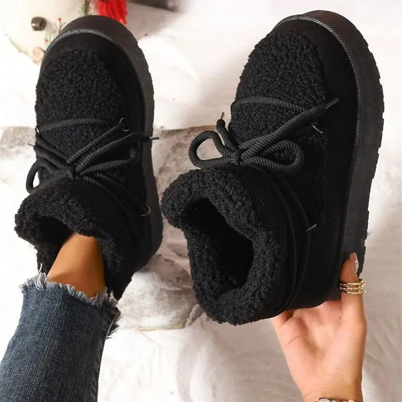 Winter-ready comfort. Snow boots designed for icy days, with fleece lining, secure grip, and effortless slip-on style.