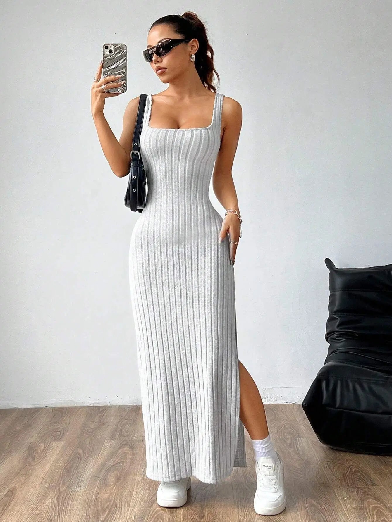 Elegant slim knitted dress with a backless design — sleek, modern, and effortlessly stylish.