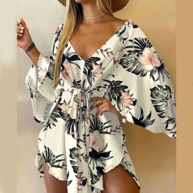 Boho Floral Mini Dress – Sexy V-Neck, Bat Sleeves & Flowy Fit for a Relaxed Summer Look.