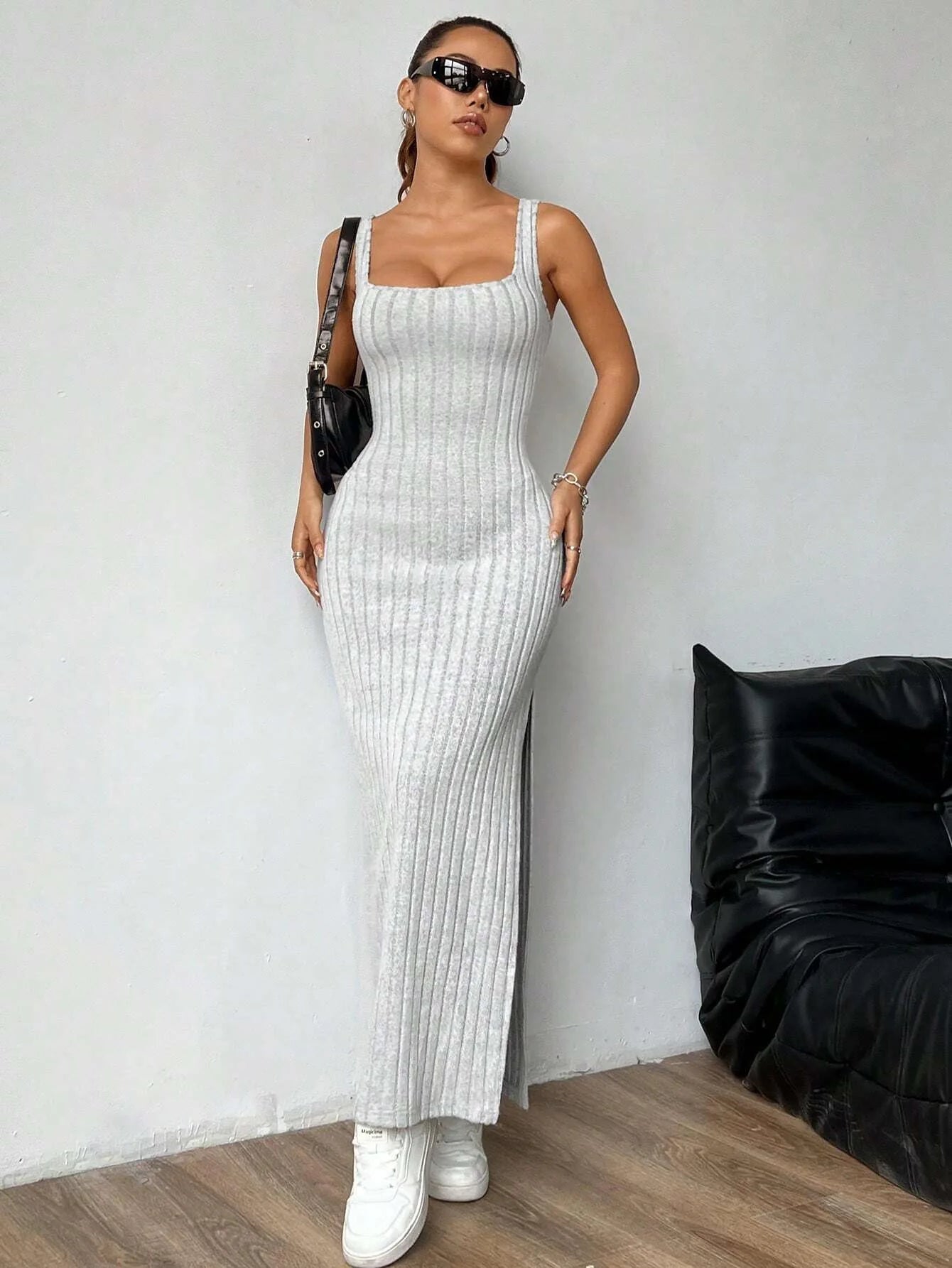 Elegant slim knitted dress with a backless design — sleek, modern, and effortlessly stylish.