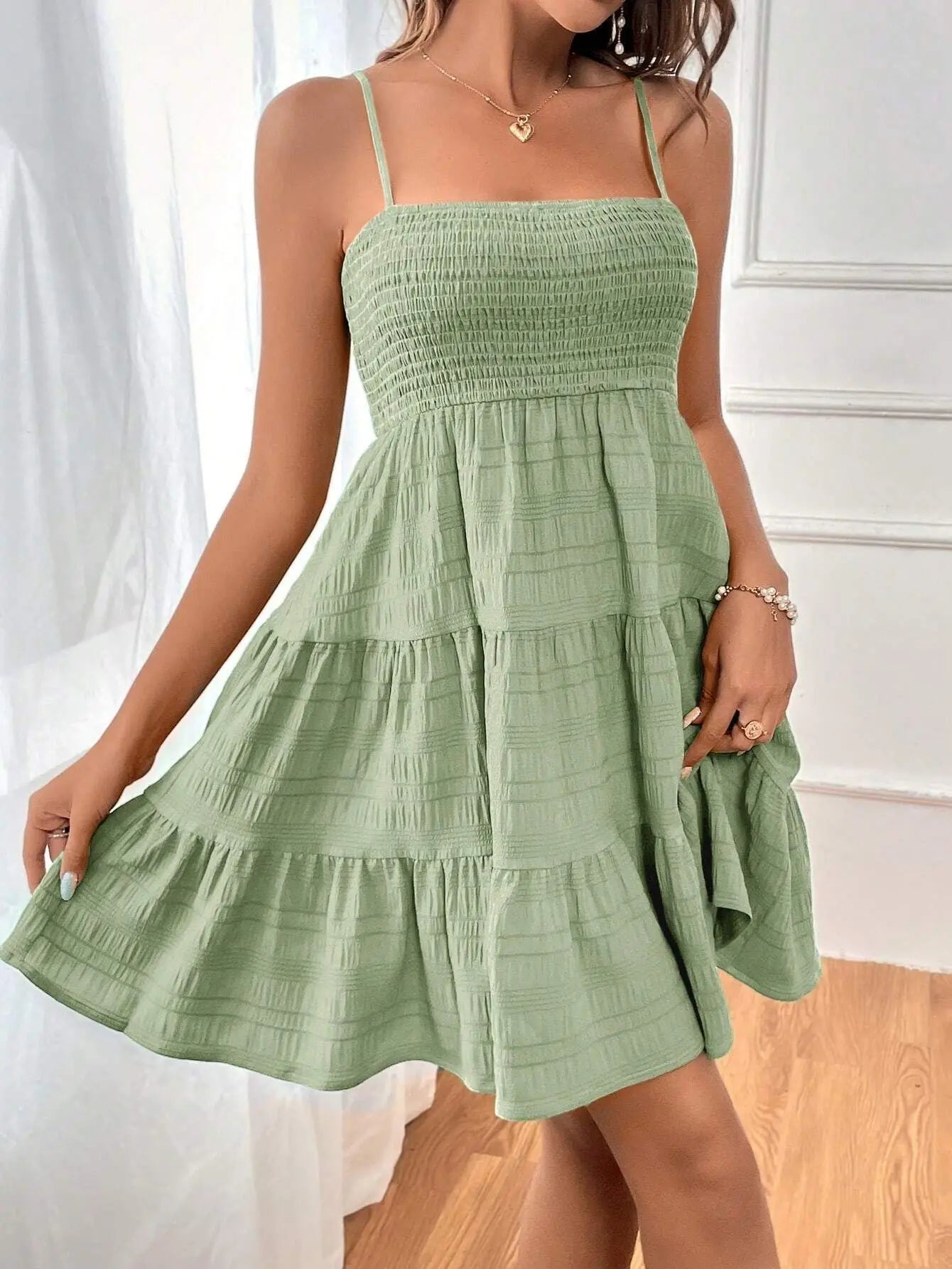 Light, feminine, and effortlessly chic — the perfect mini dress for sunny escapes.