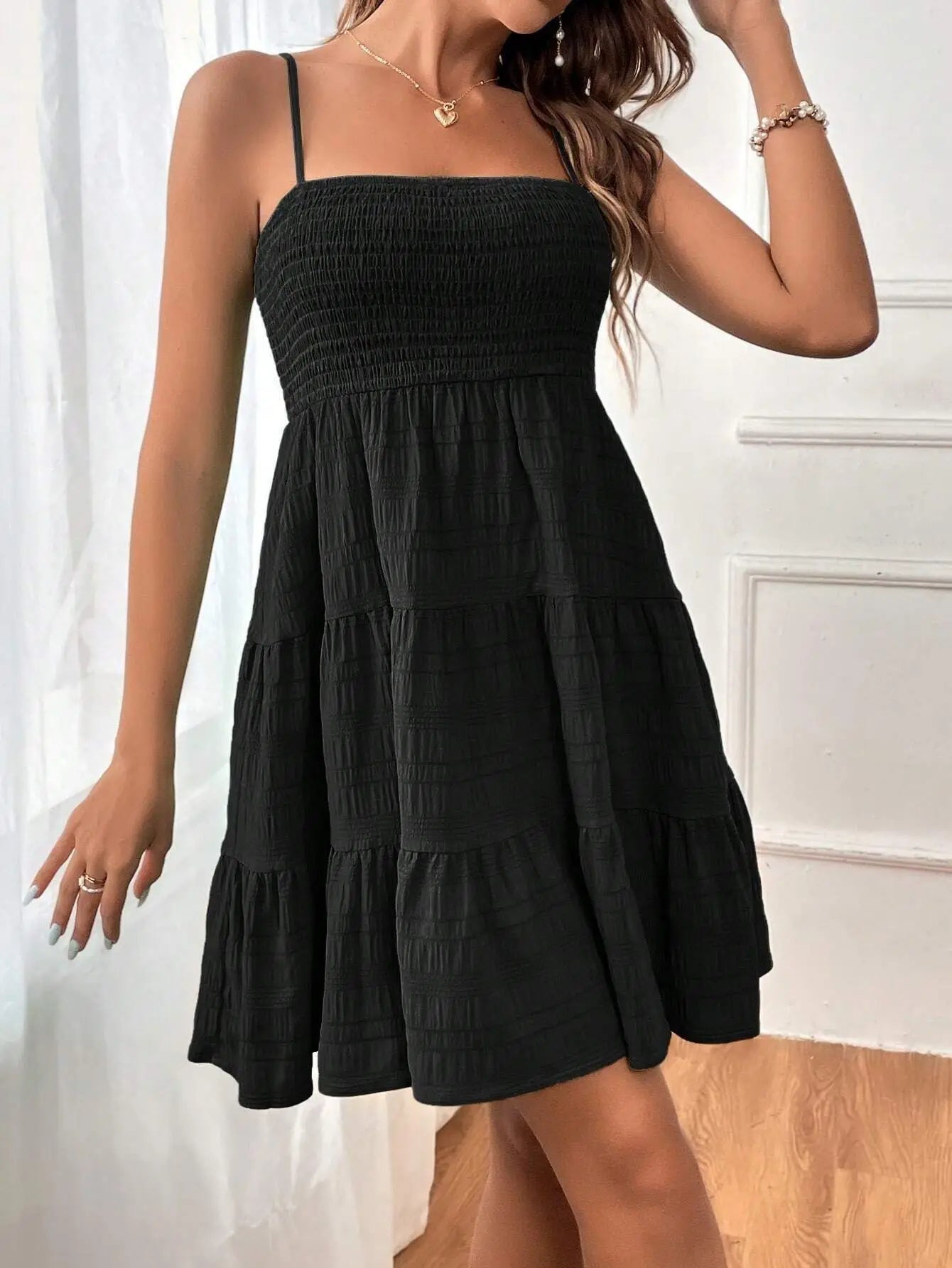 Light, feminine, and effortlessly chic — the perfect mini dress for sunny escapes.