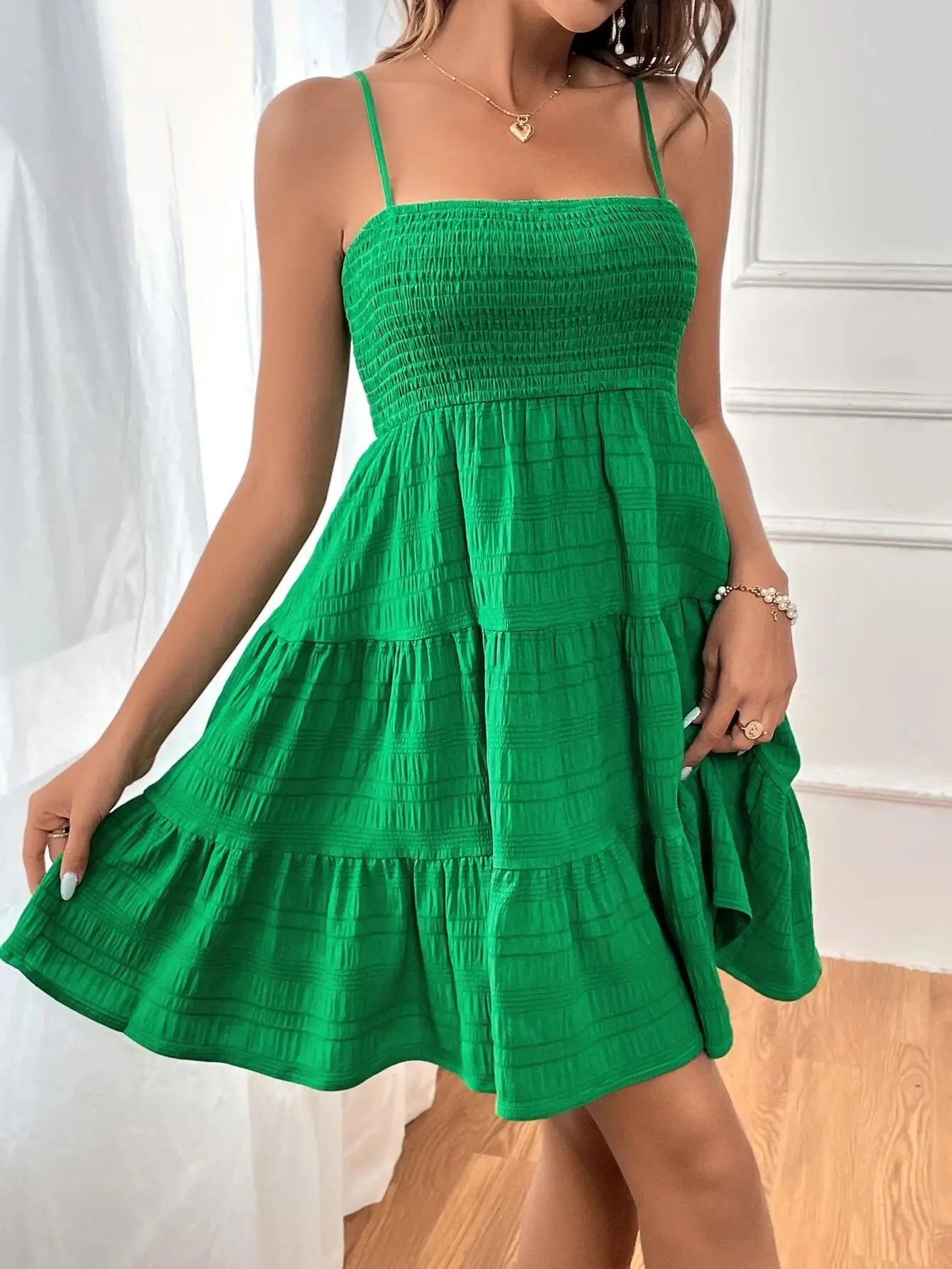 Light, feminine, and effortlessly chic — the perfect mini dress for sunny escapes.