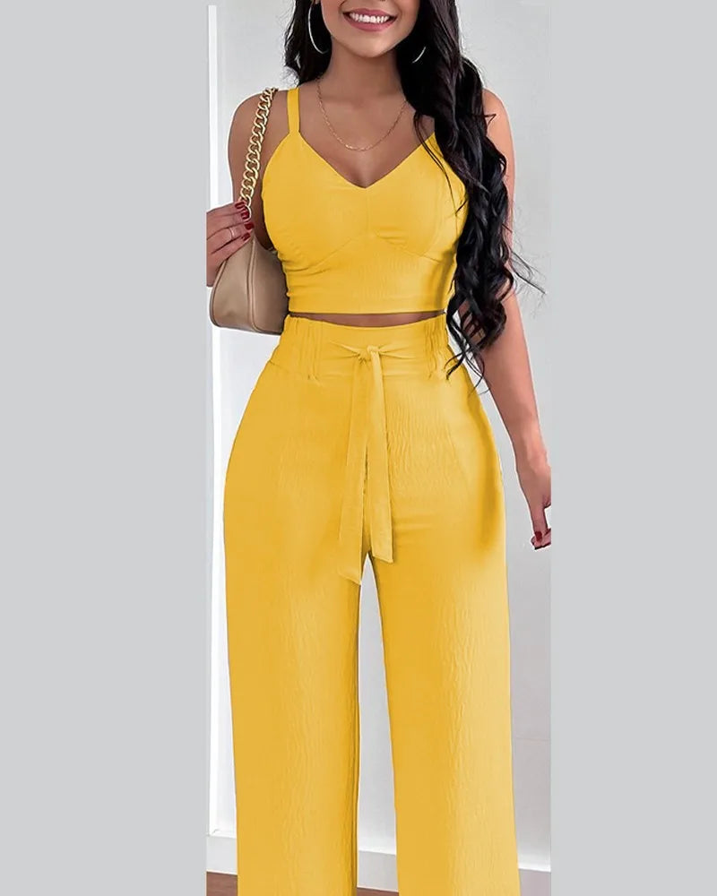 Elegant 2-piece set with a V-neck crop top and lace-up wide-leg pants — modern, flattering, and effortlessly chic.