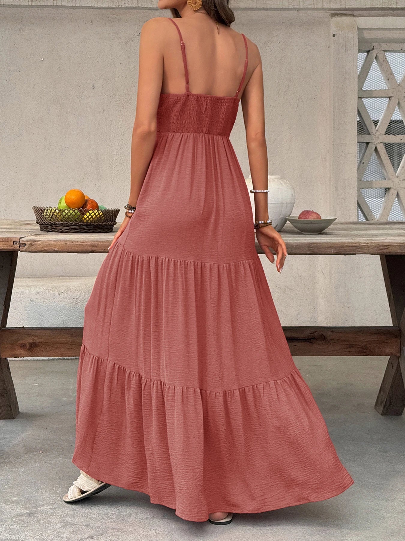 Beach dress with deep V-neck and wide sleeves. Light, relaxed, and perfect for summer days.