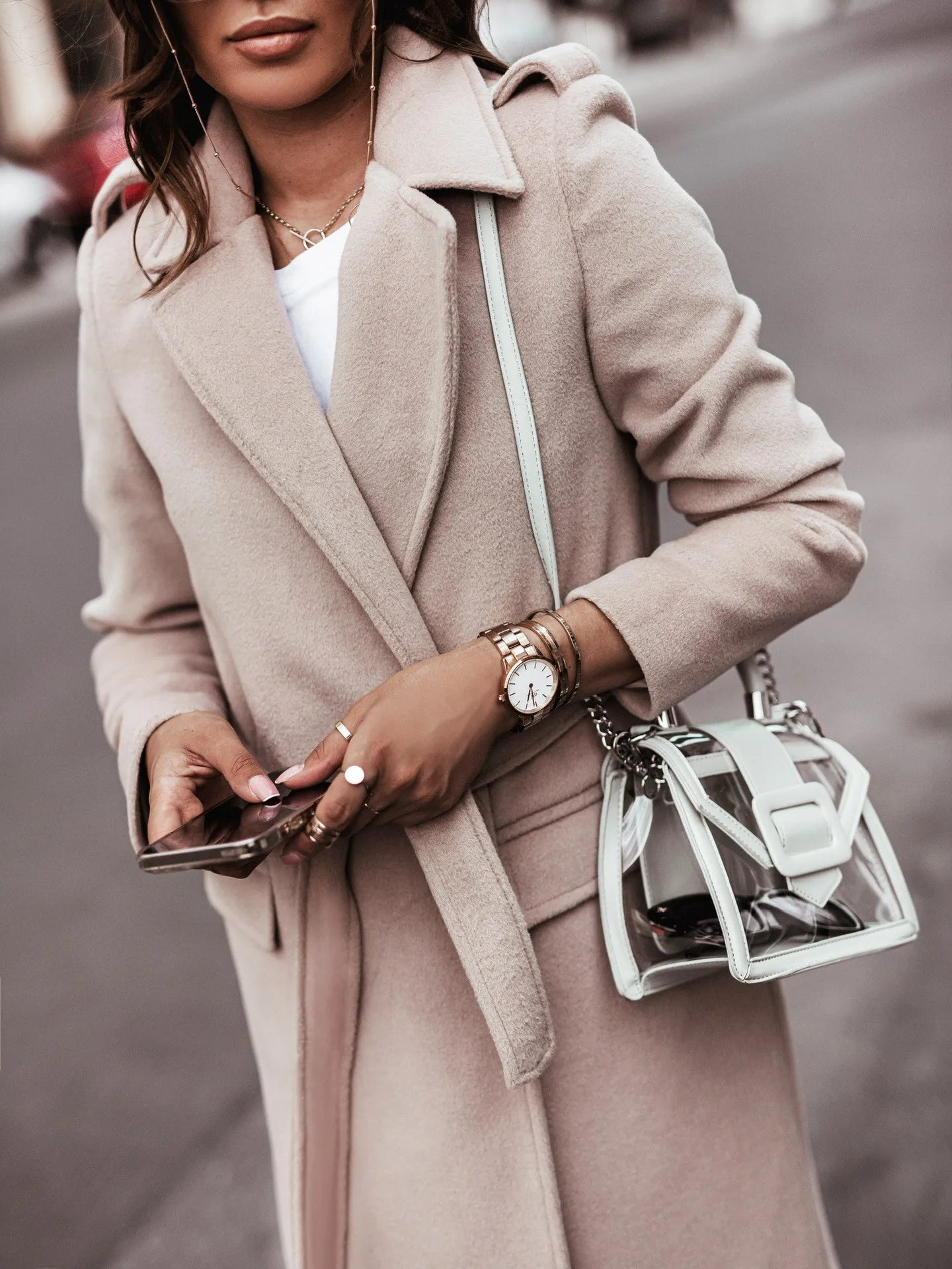Fashionable women’s wool coat with long sleeves and a belted wrap design. Elegant and versatile — perfect for spring and autumn.
