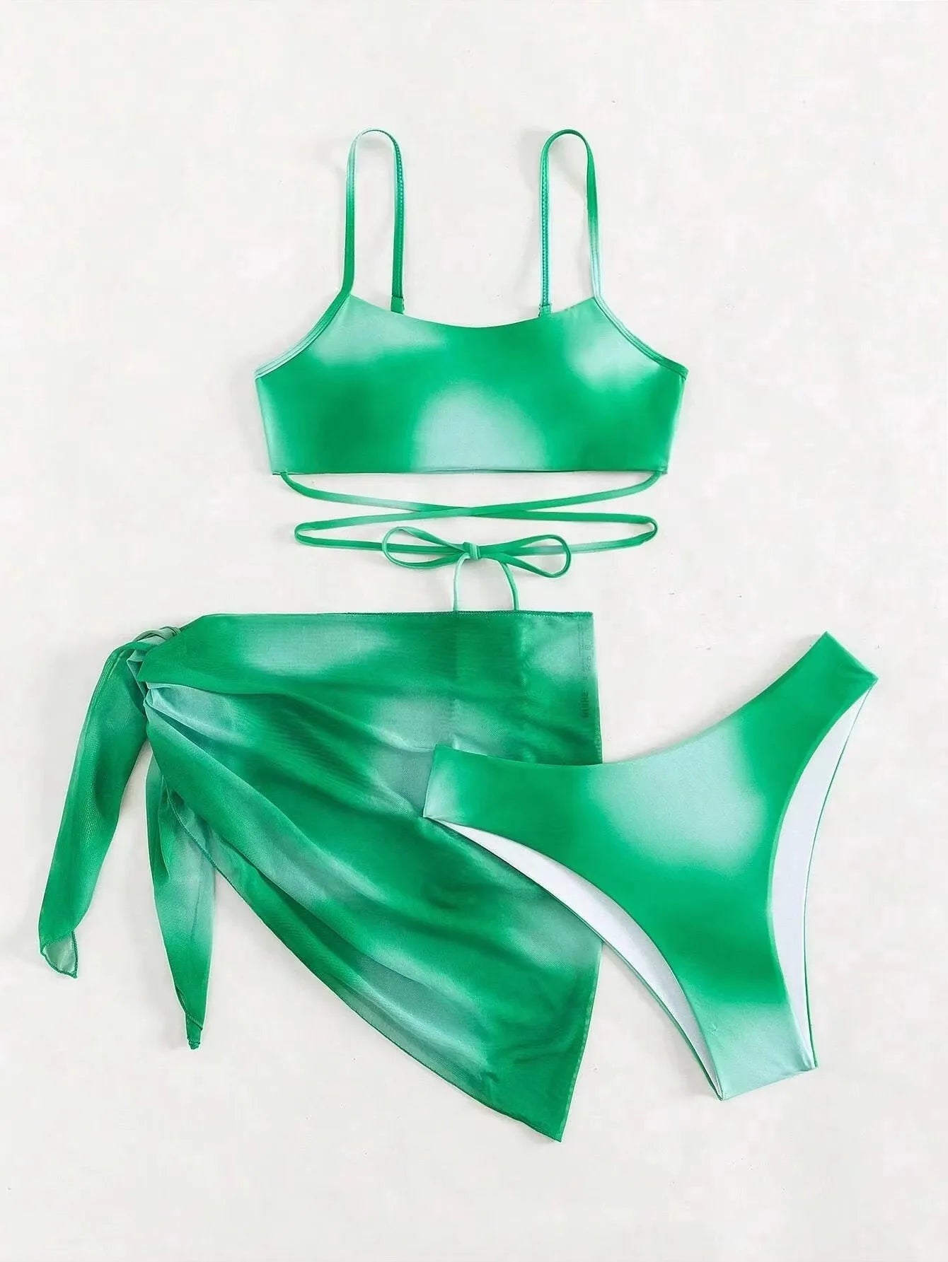 Stylish Tie-Dye 3-Piece Bikini Set with Mesh Skirt. Perfect for summer!