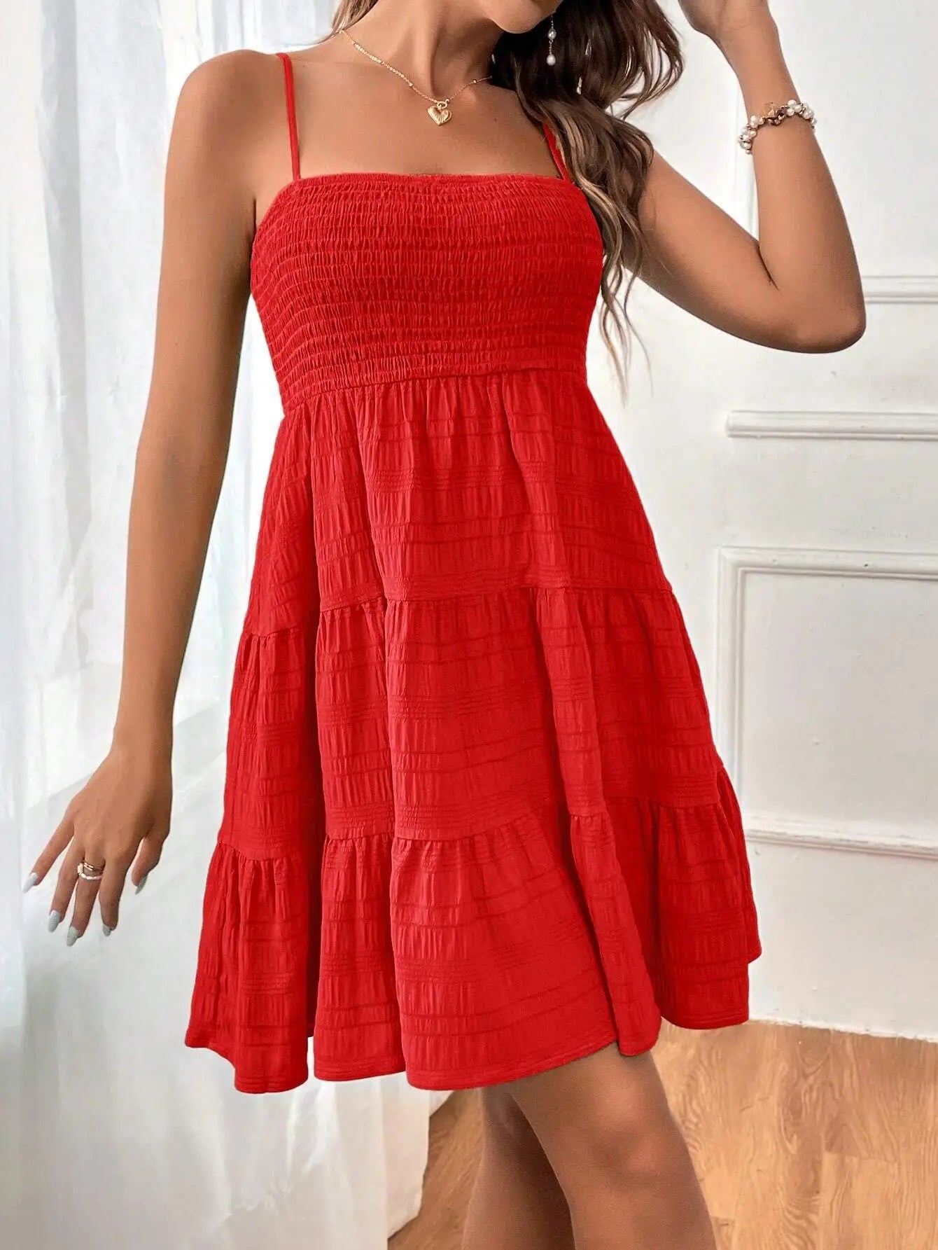 Light, feminine, and effortlessly chic — the perfect mini dress for sunny escapes.