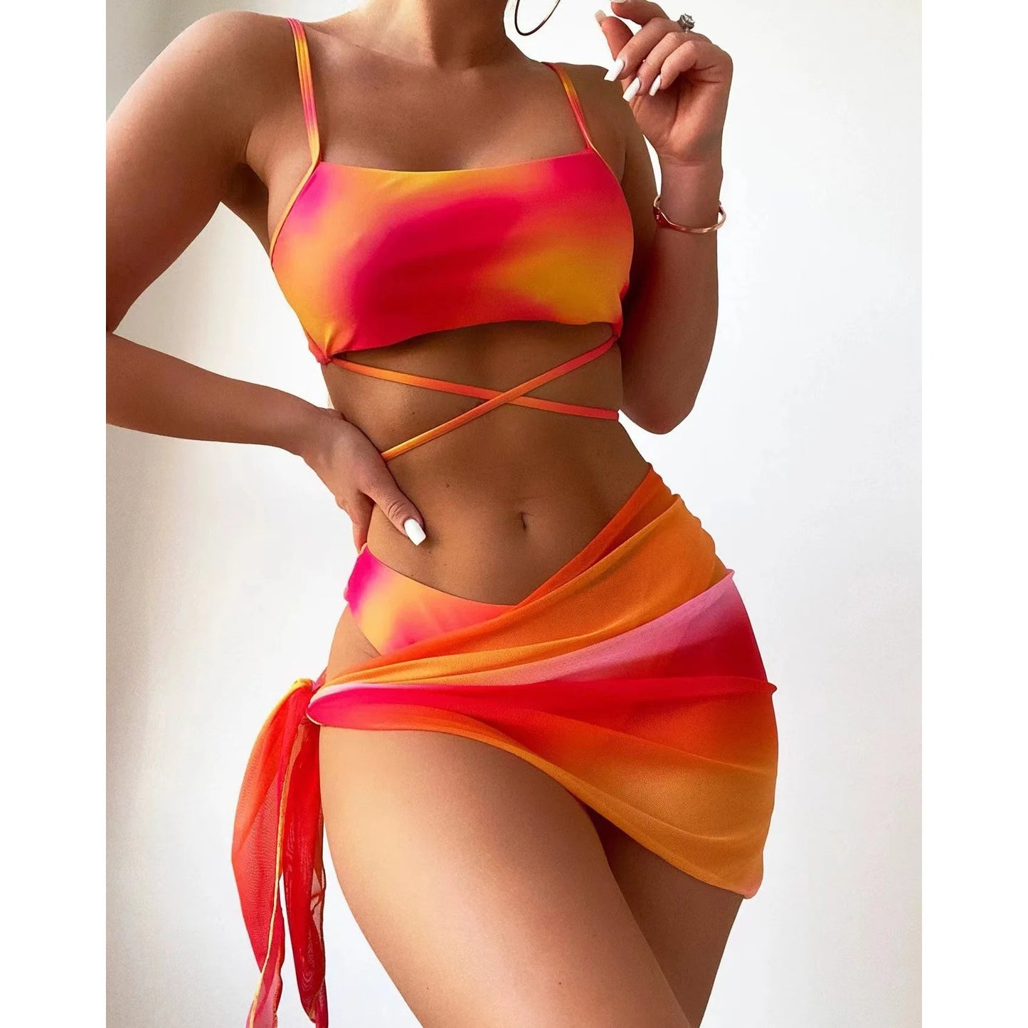 Stylish Tie-Dye 3-Piece Bikini Set with Mesh Skirt. Perfect for summer!