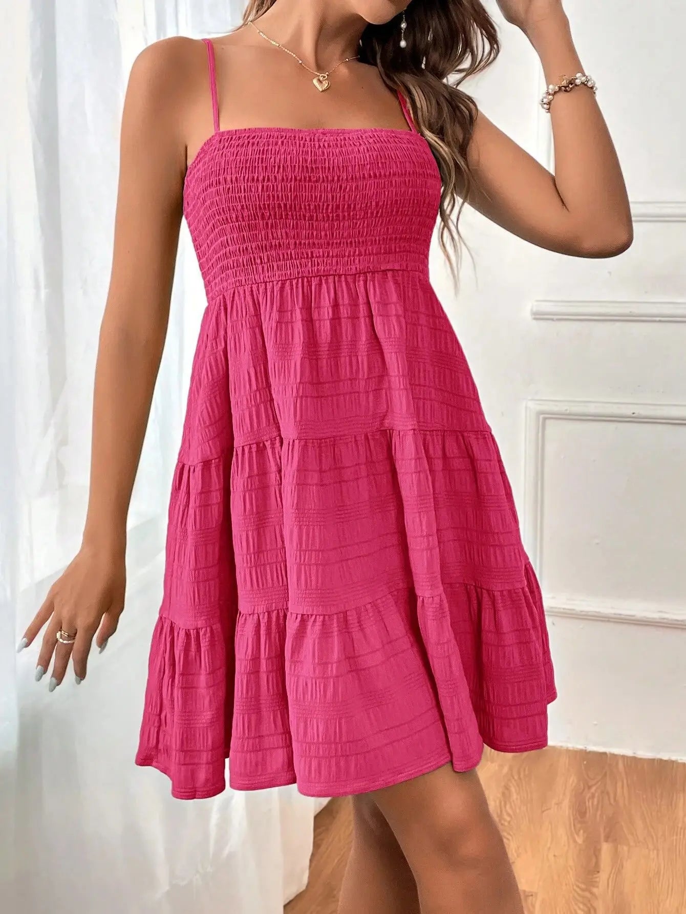 Light, feminine, and effortlessly chic — the perfect mini dress for sunny escapes.