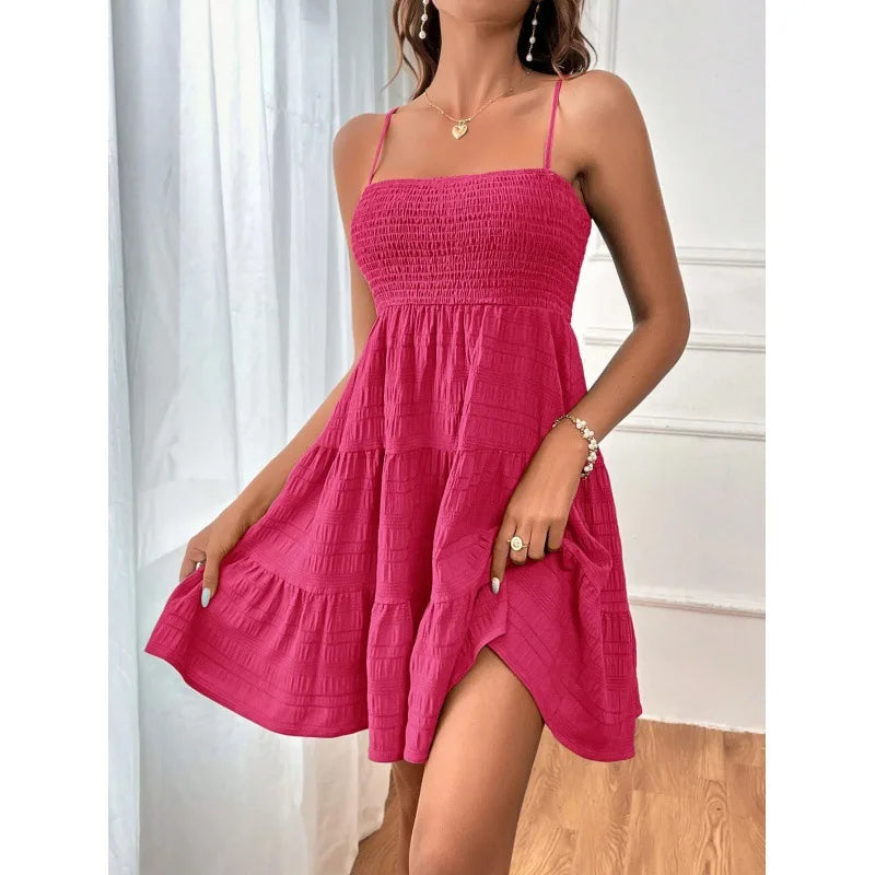 Light, feminine, and effortlessly chic — the perfect mini dress for sunny escapes.